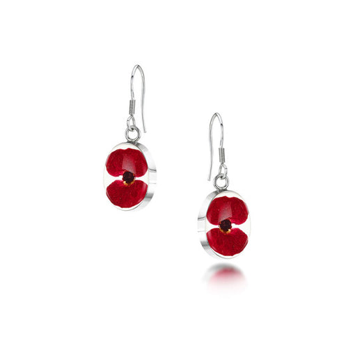 The image shows a pair of sterling silver earrings with drop loop fastenings. The earrings are oval-shaped and contain real poppy flowers contained within resin mounted in sterling silver.